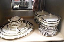 A selection of vintage Meakin table ware in the Bleu De Roi pattern including chargers, tureens