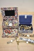 Two fabric covered jewellery boxes, containing an assortment of costume jewellery including a
