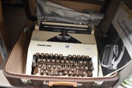 A 20th-century Swedish FACIT 1620 cream typewriter, to include a case and original instruction