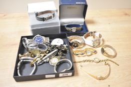 An assortment of wristwatches, including a boxed Seiko and DKYN, Timex and Pulsar