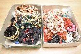 A large assortment of costume jewellery, including beaded necklaces, bracelets, statement pieces and