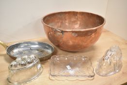 A mixed cookery lot to include a large Victorian Benham & Sons London hammered copper bowl, marked