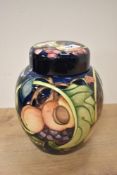 A Moorcroft Pottery 'Queens Choice' pattern ginger jar, of traditional ovoid form and tube-lined