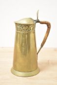 A decorative Brass Keswick School of Industrial Arts (KSIA) Arts and Crafts jug, featuring