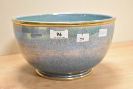 Of local interest, a late 20th-century to modern Cumbrian Tobias Harrison iridescent blue-glazed
