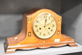 A 20th-century Art Deco style mantel clock, converted to quartz using the original hands and a