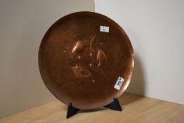 A late 19th-century to 20th-century Newlyn School Arts and Crafts copper plate, featuring a hand-