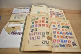 A collection of 20th-century stamps, to include two juvenile-style albums containing Great Britain
