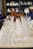 A selection of cut glass including vases and assorted drinking glasses