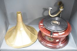 A 20th-century His Masters Voice (HMV) Sound Master Gramaphone with a brass horn and crank handle,