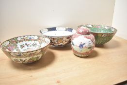 Three 20th-century Chinese ceramic decorative bowls, each decorated differently with repetitive