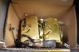 Two 20th-century Smiths floating balance rear wind striking movements and two gongs, for repair or