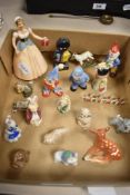 A collection of 20th-century figurines, to include nine Wade Whimsies, featuring the Noddy and
