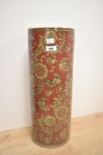 A contemporary potteryware umbrella stand / large cylindrical vase, adorned with a vibrant floral