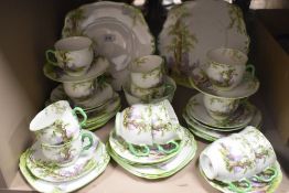 A 20th-century English Royal Albert Crown China 'Greenwood Tree' tea set, to include cups,
