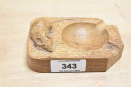 A 20th-century Robert Thompson, Kilburn, North Yorkshire 'Mouseman' oak ash tray, 10cm.