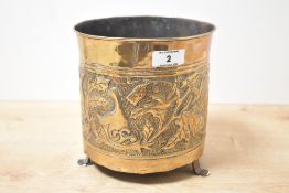 A 20th-century Keswick School of Industrial Arts (KSIA) Arts and Crafts embossed brass planter,