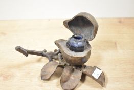 A charming 20th-century Art Nouveau-style cast and patinated metal inkwell, of pear-shaped form with