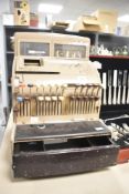 A mid-20th-century National Cash Register metal mechanical register, model number 126, standing 45cm