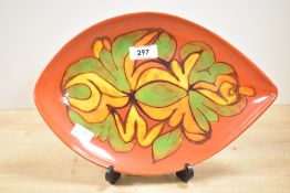 A mid 20th-century Poole Pottery Delphis pattern plate, of teardrop form with brightly coloured