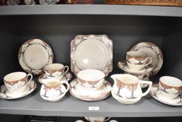 A selection of early 20th-century Crown Ducal Ware 'Orange Tree' Art Deco tea set, with a design