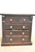 A small 20th-century mahogany tabletop chest of drawers, possible apprentice piece, currently