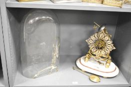 A 20th-century M. Bromley and Horsham brass skeleton pendulum clock, featuring an intricately