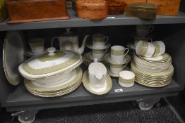 A Royal Doulton 'sonnet' pattern dinner service, having gilt edges and floral designs, to include