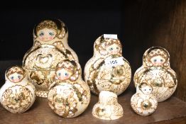 A nest of Russian dolls, largest h15.5cm