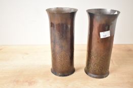 A pair of decorative Keswick School of Industrial Arts (KSIA) Arts and Crafts copper spill vases,