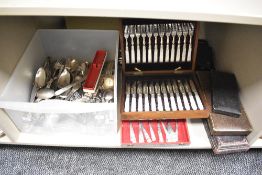 A large collection of 20th-century cutlery sets comprising stainless steel, white metal, and