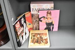 A selection of five late 20th-century to modern fashion and costume books, including 'The