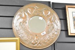 A 20th-century Keswick School of Industrial Arts (KSIA) Arts and Crafts copper mirror, of circular