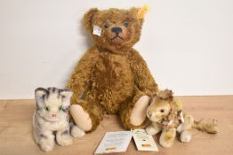 Modern Steiff Bears, 004803 Classic Bear, height 30cm with tags present, Cat and Lion, both seated