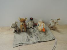 Vintage Steiff Animals, 1317 Lama, Fawn, Penguin Chick, Duck and Puppy, four with buttons in ears