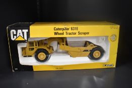 Ertl 1:50 scale Die-cast, 2430 Caterpillar 631E Wheel Tractor Scraper, internal packaging present in