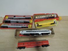 Tri-ang 00 gauge, R448 Smoking Car, R352 Budd CN Rail Car, R119 Transcontinental Mail Car, R29/221