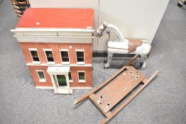 Early 20th century Dolls House and Rocking Horse, both in need of restoration, Two Storey Dolls