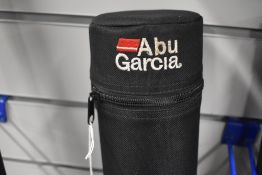 An Abu Garcia Specialist 2pc 12ft telescopic beach rod in original soft sleeve and also hard case