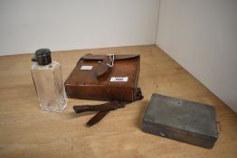 A leather cased Hip flask and pewter sandwich box with the letters G.B embossed on the top