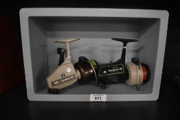 Two vintage Abu spinning reels An Abu Cardinal 4x and an Abu cardinal 40 model A both in good