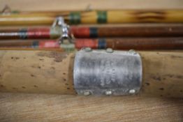 3 vintage fishing rods one hardy 3 pc wooden rod with spare tip and two bamboo rods unmarked but