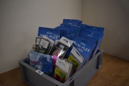 A large quantity of lures and feathers in unopened packets