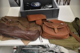 A fishing bag made from leather and canvas with a waterproof liner, A well made canvas and leather