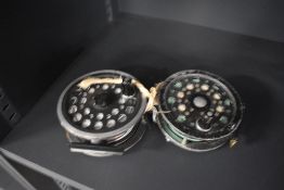 Two 4 & 1/4 inch Shakespeare salmon fly reels one Super Condex the other a Beaulite both well used