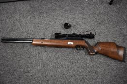 A .22 Weihrauch HW97K air rifle with simmons 4 x 40 fully coated optic gold scope
