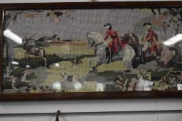 A Tapestry depicting stag hounds measuring 57cm x 26cm in an oak frame framers name to rear W