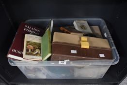 A mixed box of used tackle containing fishing boxes containing lures, fishing line, weights and