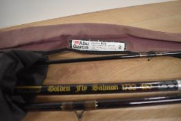 An Abu Garcia conolon 800 2 meter 2pc and a Shakespeare golden fly salmon 1732 4503pc 15ft both in