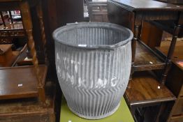 A vintage galvanised dolly tub, of traditional spouted form 52.5cm x 56cm